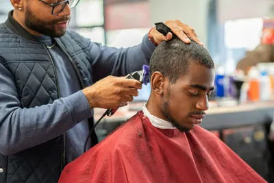 How black barbers in London are giving poor mental health the chop -  Positive News