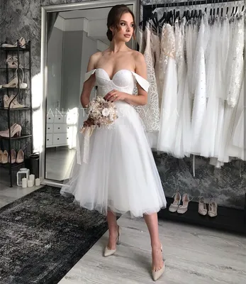 Изображение белого платья до колен