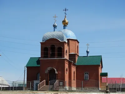 Фото \"Площадь перед Домом культуры имени А. С. Пушкина. Памятник  первоцелинникам\", 1974 год, Челябинская обл., Брединский р-н, пгт. Бреды -  История России в фотографиях