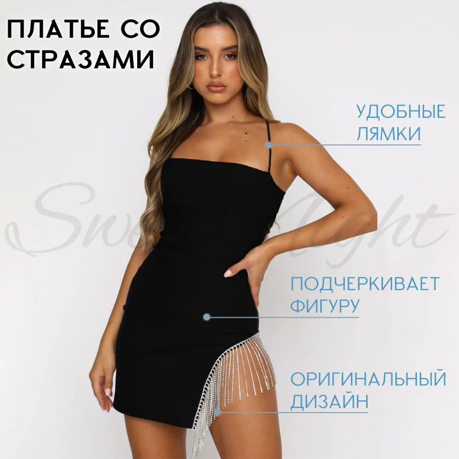 Стильное черное платье мини на фото Стильное черное платье мини на фото