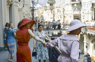 Christian Dior models walks through a Moscow market during a \"street  fashion show\" when Soviet Russia first allowed foreign designers and  stopped arresting people for trendy clothing. June 1959. Photo by Howard