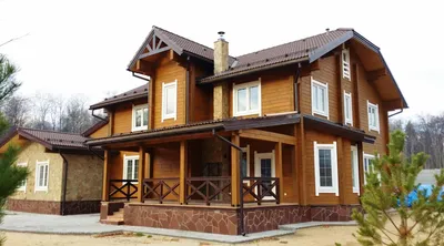 Оригинальный вариант дизайна дома из бруса на картинке