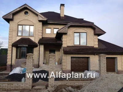 Картинка дизайна гостинной 50 кв в доме с лестницей