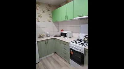 Фото дизайна кухни в частном доме с островом