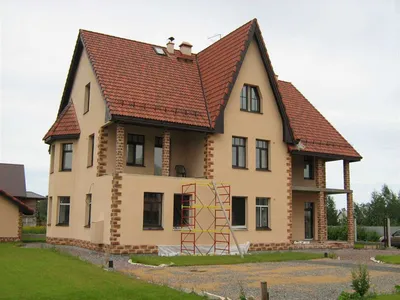 Картинка с примером дизайна штукатурки дома