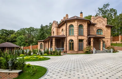 Фото дизайна внешней отделки дома с использованием природных материалов