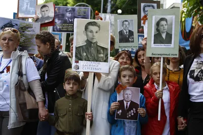 В \"Бессмертном полке\" в Анголе участвовали граждане России и Украины - РИА  Новости, 09.05.2022