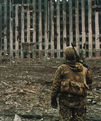 FILE - This Jan. 21, 1995 file photo shows a side view of the smoking  Presidential Palace which stands out amid the devastation in the center of  Grozny, Chechnya, Russia. During Russia's