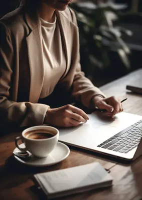 Coffee table with laptop and notebook Stock Photo by ©Hvoenok 99267002