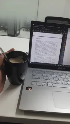 Laptop, Books And Coffee Cup On A Wooden Table In A Dark Room Free Image  and Photograph 198368252.