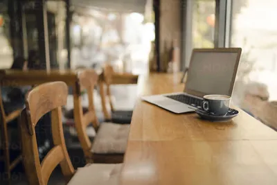 A Cup of Coffee on a Laptop · Free Stock Photo