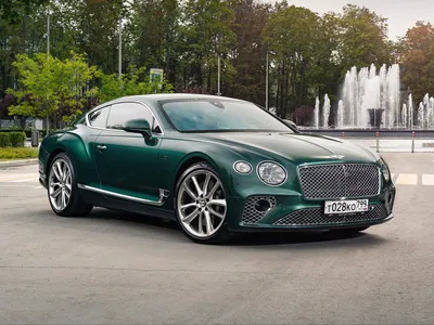 Обои на рабочий стол Двухдверное 4-местное купе Bentley Continental GT на  улице ночного города, обои для рабочего стола, скачать обои, обои бесплатно