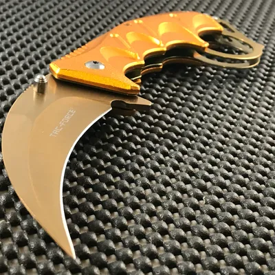 Reviews and Ratings for United Cutlery Honshu Karambit 4\" Gold Stonewashed  Blade, Shoulder Harness, Plastic Sheath - KnifeCenter - UC3131