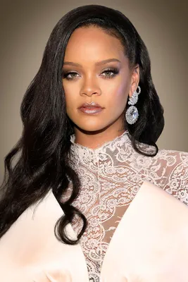 Rihanna's Baby Reveal Pics Are Cute, Sure, But Can We Talk About Her Tower  of Curls? See Photos | Allure