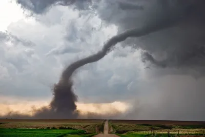 dramatic and powerful tornado. Lightning thunderstorm flash over the night  sky. Concept on topic weather, cataclysms (hurricane, Typhoon, tornado,  storm). Stormy Landscape. Stock Photo | Adobe Stock