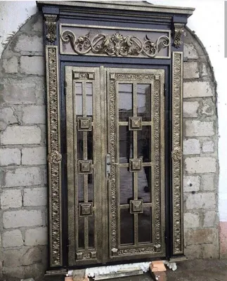Кованые входные двери: цены и фото