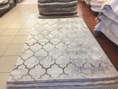 Современные ковры на пол в спальню - 64 фото
