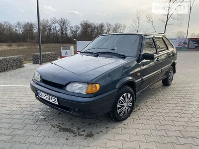 Green Lada 2114 Year Front View With Dark Gray Interior In Excellent  Condition In A Parking Space Among Other Cars Stock Photo - Download Image  Now - iStock