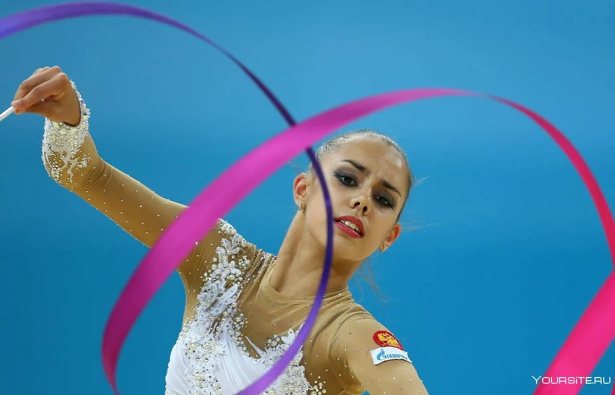 Олимпийская чемпионка по гимнастике. Яна Кудрявцева олимпиада 2016 булавы. Гимнастка Маргарита Мамун. Маргарита Мамун обруч 2013. Яна Кудрявцева олимпиада булавы.