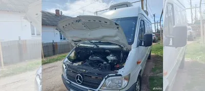 Mercedes-Benz TN на заднем плане зданий в городе