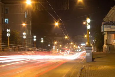 TOMSK, RUSSIA - September 25, 2019: Panorama night city scape in light of  lanterns with moving cars – Stock Editorial Photo © ParStud #314694846