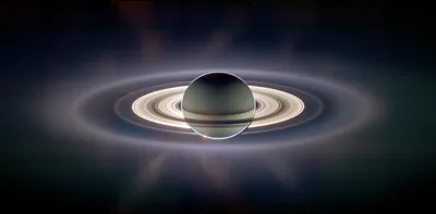 Bits of Saturn's rings are falling onto the planet and heating it up | New  Scientist