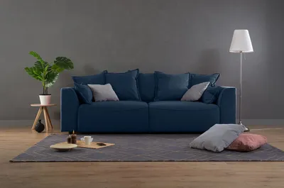 Синий диван в интерьере: с чем сочетать и как расположить