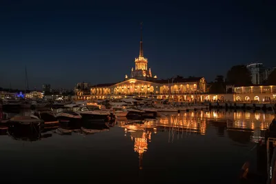 A body of water with a city in the background photo – Free Sea Image on  Unsplash