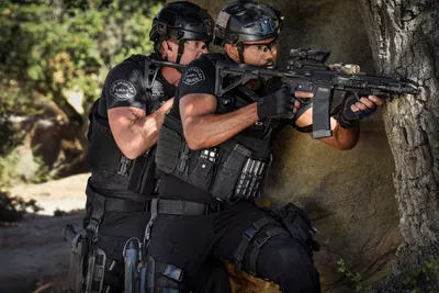 Studio shot of SWAT police special forces, green background. Poster Print  by Oleg Zabielin/Stocktrek Images - Item # VARPSTZAB101087M - Posterazzi