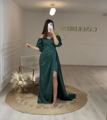 Темно зеленые платья: привлекательность и красота