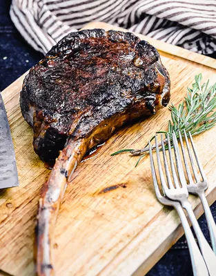 Grilled Tomahawk Steak with Herb Butter - Vikalinka