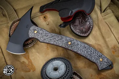 https://eknives.com/toor-knives-tomahawk-heavy-metal-carbon-fiber-fixed-blade-11-black-w-kydex-sheath/