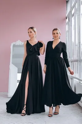 Вечернее черное платье на пляже